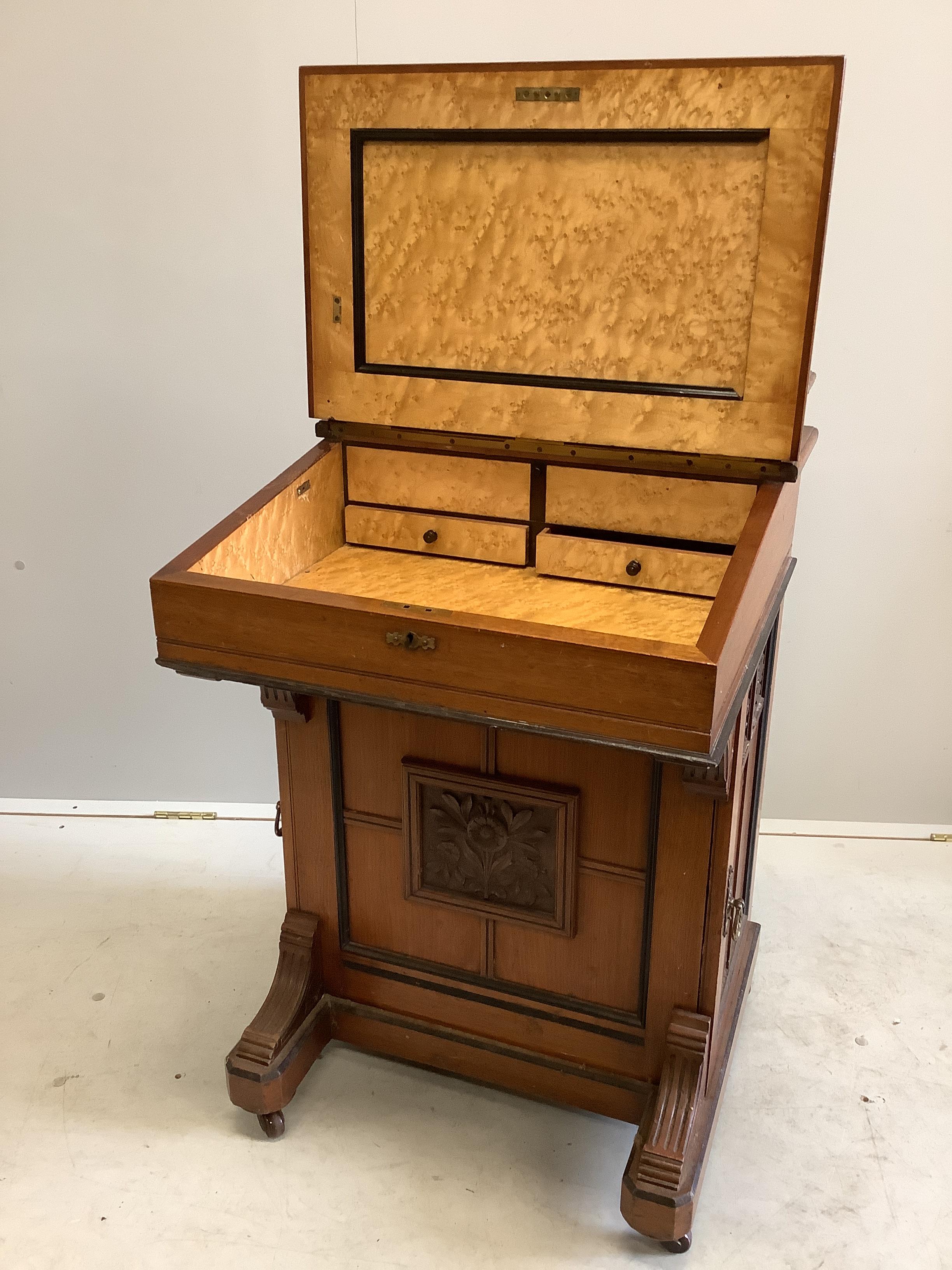 A late Victorian Aesthetic movement mahogany davenport by Jas. Shoolbred & Co., width 56cm, depth 56cm, height 94cm